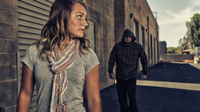Girl who knows self defense sees a man walking behind her