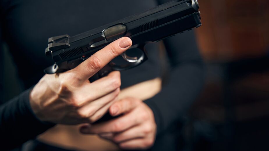 Woman getting ready for a shooting drill Rob Doar Law Woman getting ready for a shooting drill